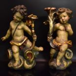 Ein Paar Leuchterputten. Barockstil, wohl Tirol, 20. Jh. | Holz, geschnitzt, Farb- und Goldfassun...