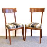 Ein Paar Stühle. 20. Jh. | Mahagoni und andere Hölzer, gebeitzt. Stoffbezug.