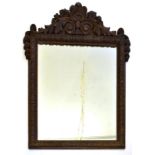 Großer Spiegel. 19./20. Jh., Barockstil | Eiche (?), gebeitzt, geschnitzt.