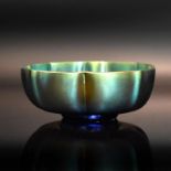 Kleine Myra-Schale. Wohl WMF | Farbloses Glas. Flächig mit Silbergelbbeize bemalt. Irisiert.