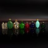 Acht Snuff Bottles. China, 19./20. Jh. | Farbloses bzw. farbiges Glas, tlw. opak.