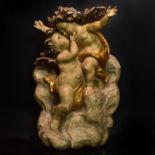 Zwei Putten auf Wolkenbank. Tirol/Alpenraum, 20. Jh. | Holz, geschnitzt, Farb- und Goldfassung.