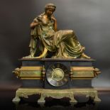 Tischuhr. 19./20. Jh. | Gelbguss. Schwarzer Stein.