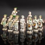 Neun Figuren. Ludwigsburg, 20. Jh. | Porzellan, Farb- und Goldstaffagen bzw. weiß.