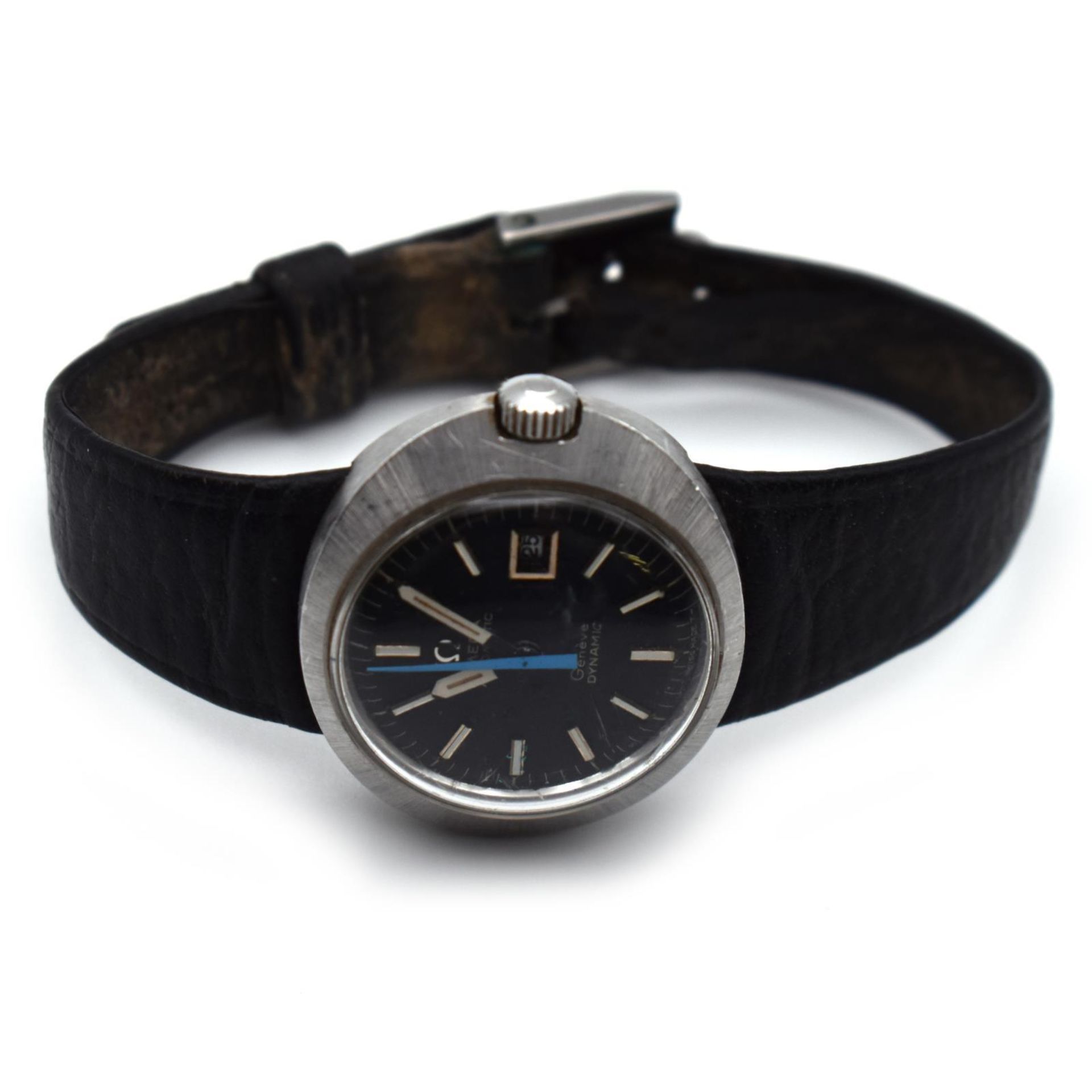 Vintage-Armbanduhr. Omega dynamic, Genf | Gehäuse Stahl, schwarzes Lederarmband.