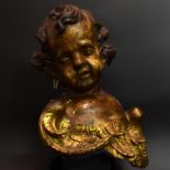 Geflügelter Puttenkopf. Wohl Süddeutschland, 18./19. Jh. | Holz, geschnitzt, Reste von Farb- und...