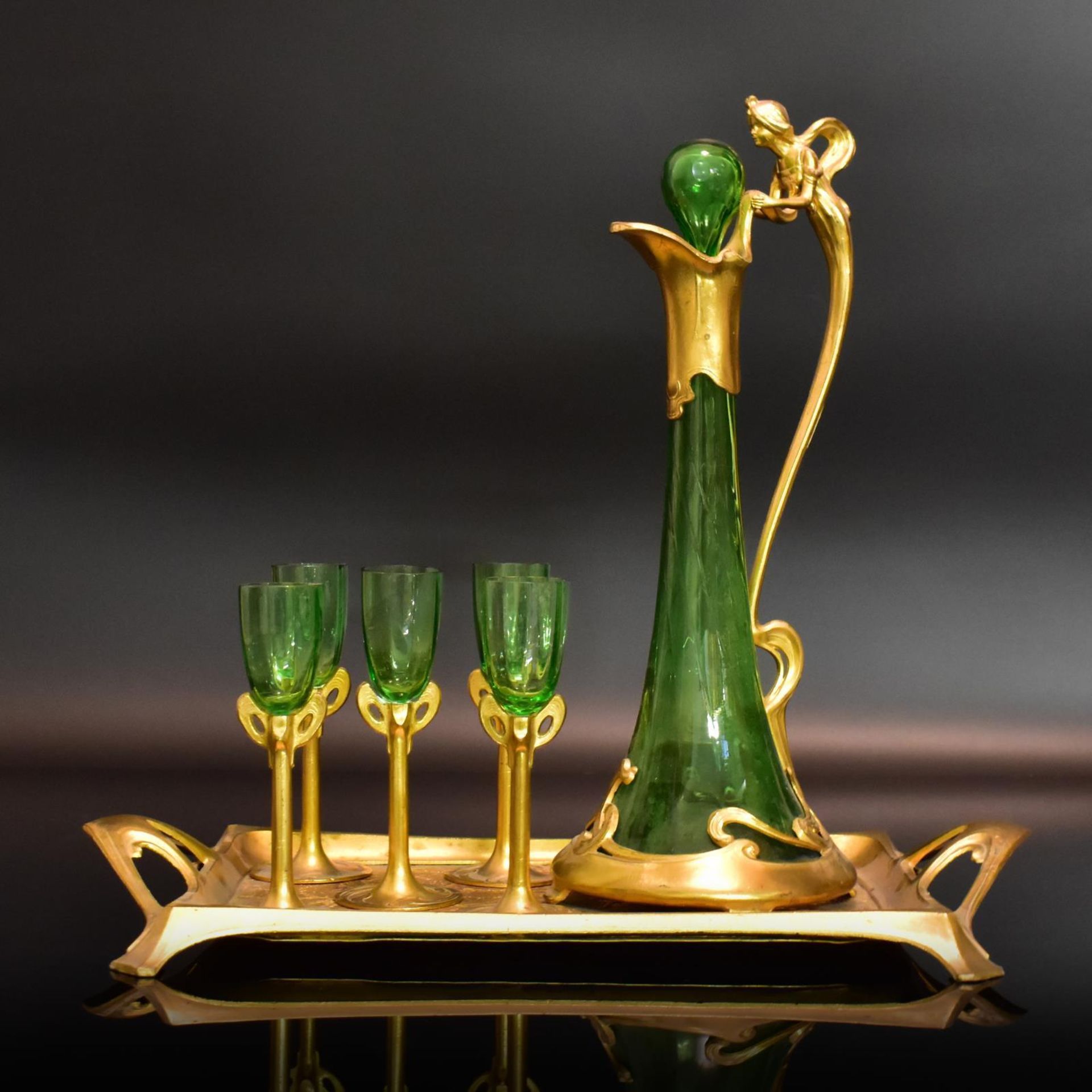 Likörservice, 7tlg. Im Stil des Jugendstils | Grünes Glas, Metall.