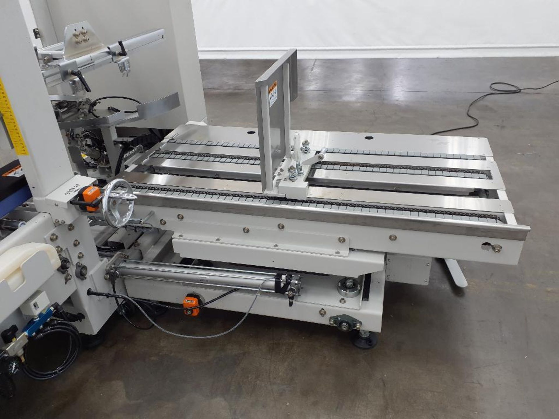 Interpack Case Erectors form RSC- or HSC-style cases by pneumatically ...