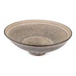 Dame Lucie Rie (1902-1995), A monumental stoneware knitted bowl on shallow foot