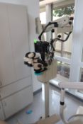 Dental microscope on telescoping mount with a Canon G15 camera and TFT color monitor