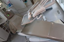 Dental chair by Belmont, model Excalibur, with Aidee air compressor and instrument tray with instrum