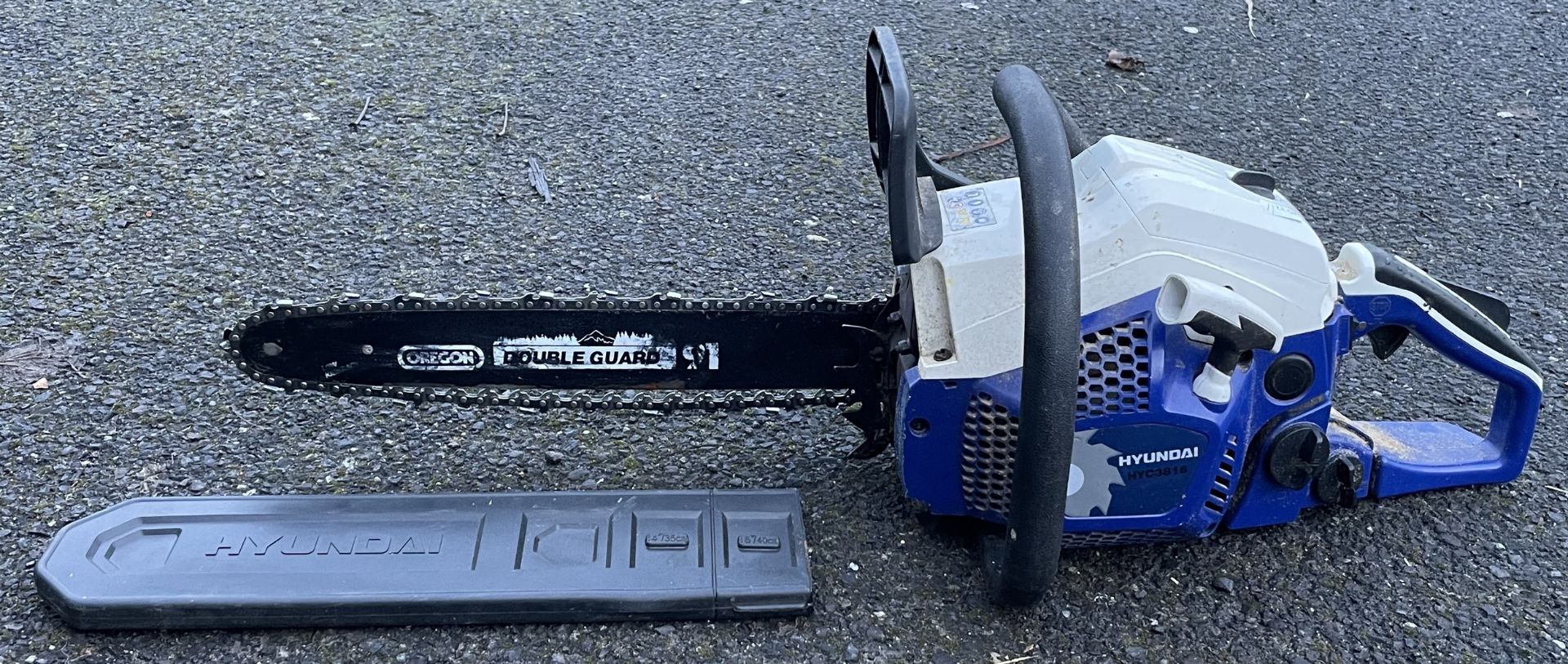 A Hyundai HYC3816 petrol driven chainsaw.