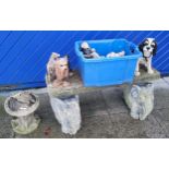 A stone effect composite garden seat, having elephant-shaped supports, width 100cm, together with