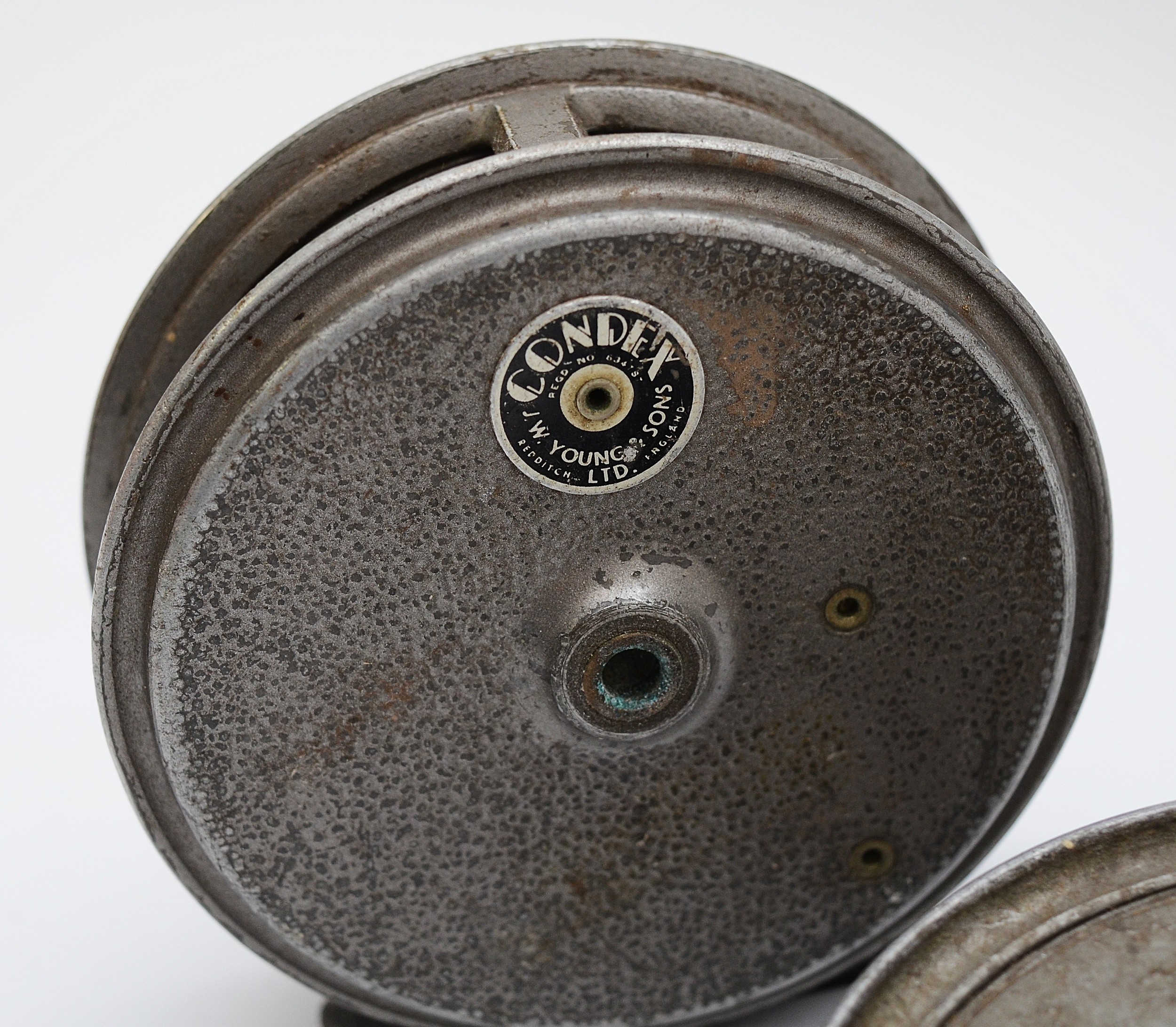 J.W. Young & Sons Ltd, The 'Pridex' fly fishing reel, steel foot, single handle operation, design - Image 2 of 3