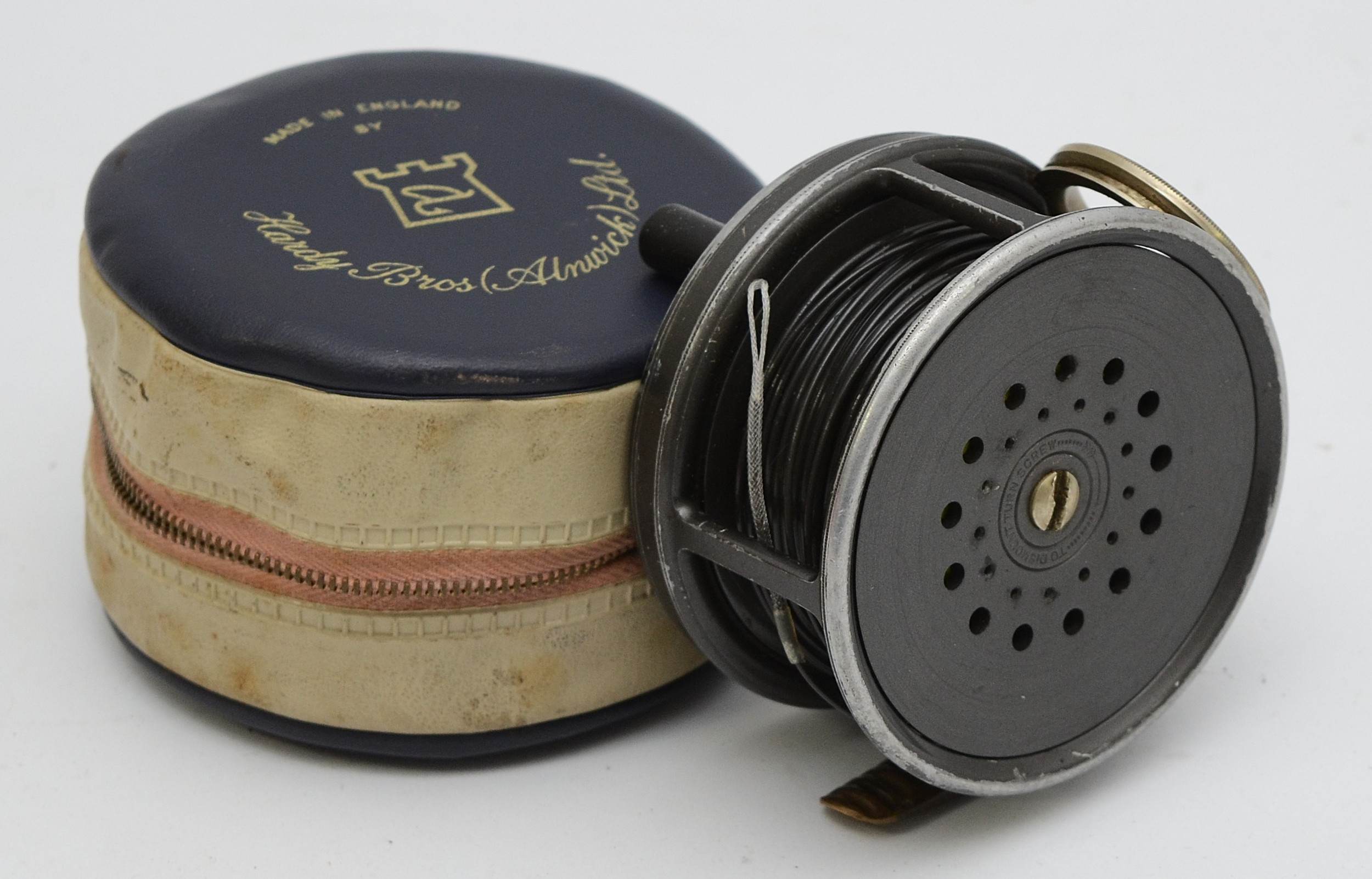 Hardy Bros Ltd, The 'Perfect' fly fishing reel, ribbed brass foot, steel line guard, 9cm diameter,