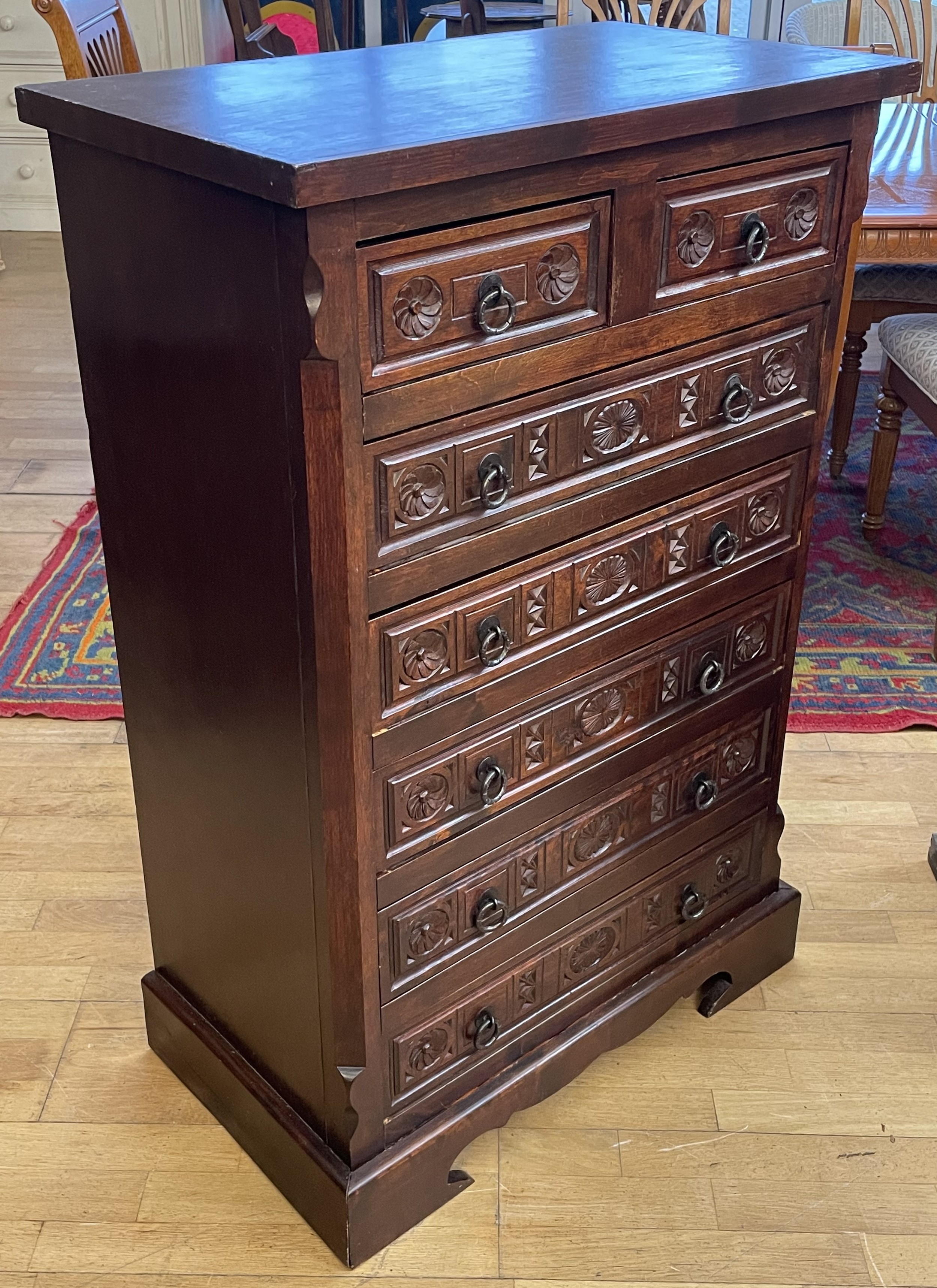 A 20th century carved oak Wellington chest of drawers, in the French ...