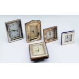 Five Italian silver miniature desk clocks, all having quartz movement, the largest one measuring