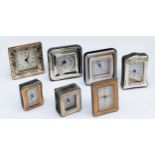 Seven Italian silver miniature desk clocks, all having quartz movement, the largest one measuring