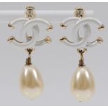Chanel, a pair of Chanel logo imitation pearl drop earrings, 35mm drop