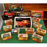 A collection of boxed and loose Burago diecast model cars, 1/18 and 1/24 scale, in one box.
