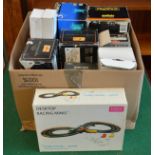 A collection of various boxed diecast and plastic model cars, including Maisto Special editions,