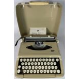 A vintage SCM Empire-Corona De Luxe portable typewriter.