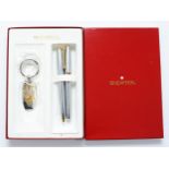 A Sheaffer boxed gift set compromising of a lidded fountain pen, a twist action ball point pen,