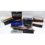A quantity of various rolled gold, brushed steel, and resin ball point and fountain pens,