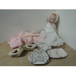 Armand Marseille Bisque Headed Doll, early 20th century having sleep blue eyes, open mouth,