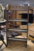 An early 20th Century oak open book shelf of small proportions, width approx. 46cm