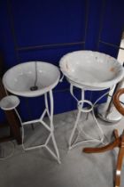 Two metal wash stands in the French style
