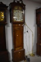 A 19th Century mahogany long case clock having eight day movement and painted arch dial , having