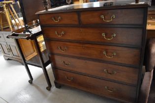 A Georgian mahogany chest of two over four drawers having brass drop handles and bracket feet,
