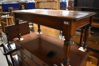A modern mahogany coffee table in the classical style