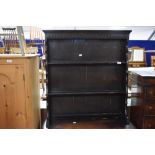 A vintage dark stained Ercol style dresser, width approx. 91cm