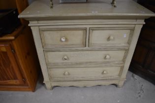 A modern two over two chest of drawers , having distressed finish, dimensions approx. W94 D48 H85cm