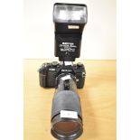 A Zenit 11 35mm SLR camera with a Helios 44 58mm f2 lens. Sold alongside a Soviet Jupiter-IIA 4/