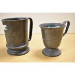 An 18th/19th century pewter tankard, of traditional form, engraved with ownership initials RL, and