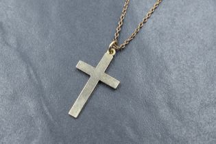 A 14ct gold cross pendant of plain form on an 18' 9ct gold chain, approx 5.5g gross