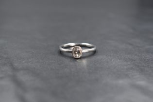 A platinum Pheonix cut diamond solitaire ring, the radiant shaped pheonix cut diamond being approx