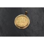 An Edwardian 1907 sovereign in a 9ct gold pendant mount, having decorative engraving, marked 9kt,