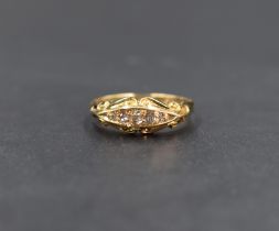 An 18ct gold diamond set five stone ring, the five graduated old cut diamonds, in a channel style