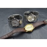 A black faux leather watch case, of rectangular form having six compartments, containing a Pulsar,