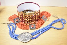 A collection of costume jewellery, including beaded jewellery and statement pieces and a white metal