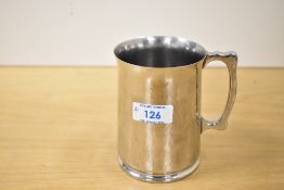 A 20th-century Keswick School of Industrial Arts (KSIA) Arts and Crafts hammered stainless steel (