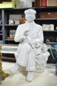 A Chinese Maoist/cultural revolution blanc-de-chine porcelain figure of Chairman Mao Zedong