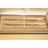 A vintage Cross Classic Century 14k gold-filled pen and pencil set, presented in its original box,