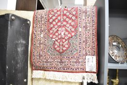A small contemporary Turkish hand woven floss thought to be silk Kayseri rug, of traditional