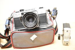 A Praktica TL 3 35mm camera, with built-in TTL light meter, solid all-metal body, and a 50mm Carl