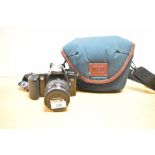 Canon EOS 500 SLR 35mm film camera, with a Canon 28-80mm f3.5-5.6 II lens.